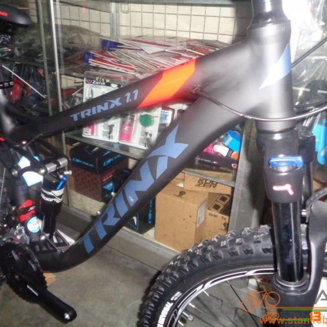 trinx full suspension mountain bike